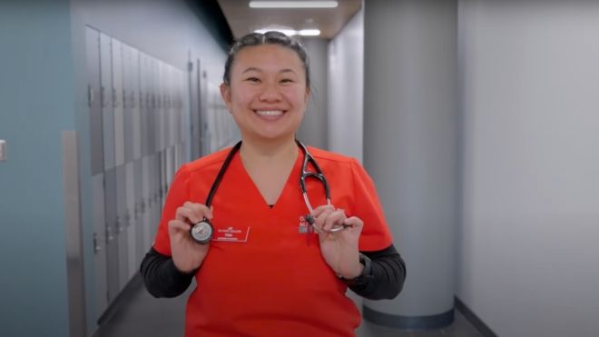 Nursing student posing with stethoscope in Bldg. 7