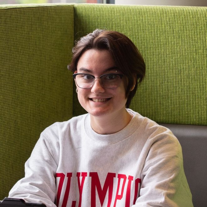 Female student in chair.