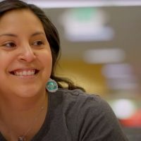 Close-up of student smiling in Bremer Student Center