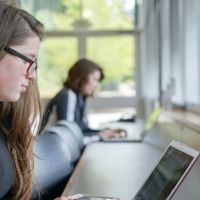 Students studying on laptops
