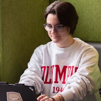 Female student with tablet.