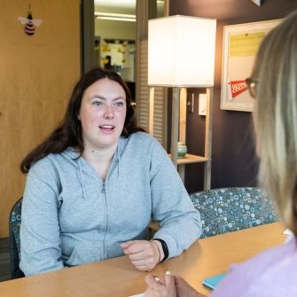 Female at Advising appointment. 