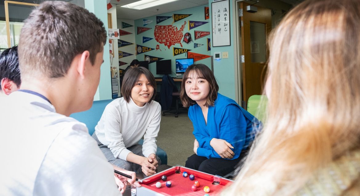 Students playing pocket pool.