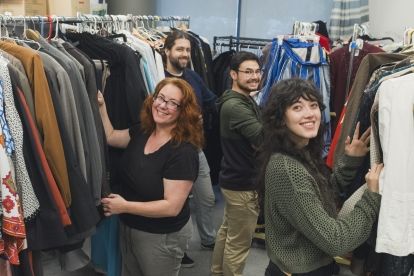 Filmmaking students in wardrobe room