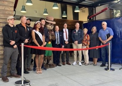 Group photo just before the ribbon cutting for Olympic College's remodeled Shops Building