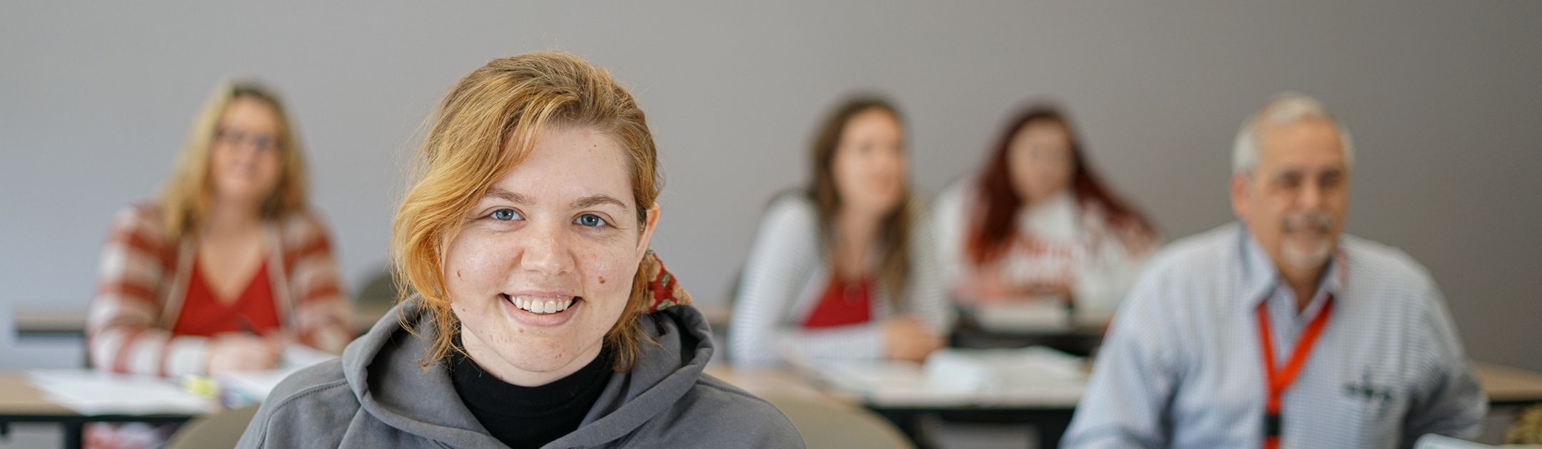 Female student in classroom.