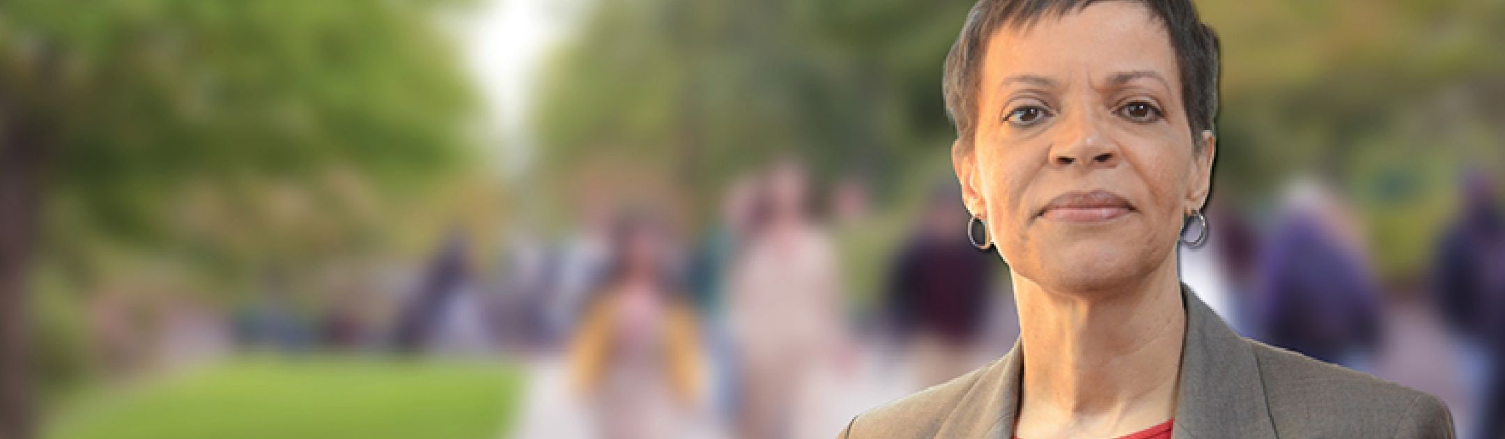 Teresa McDermott with blurred background.