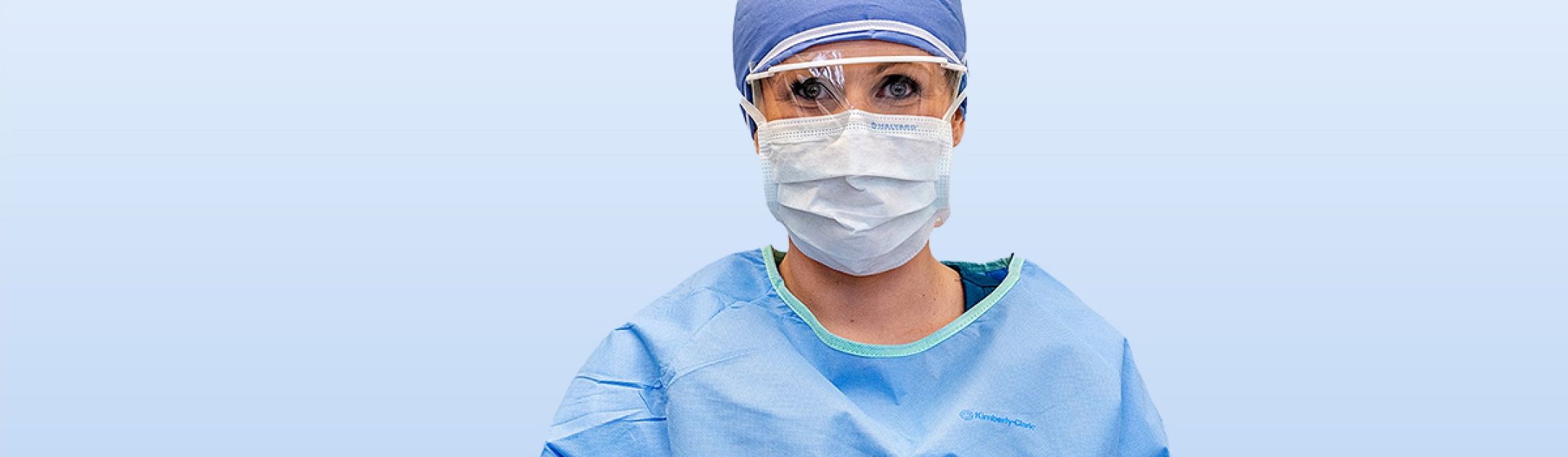 Surgical Technician holding tools for surgery