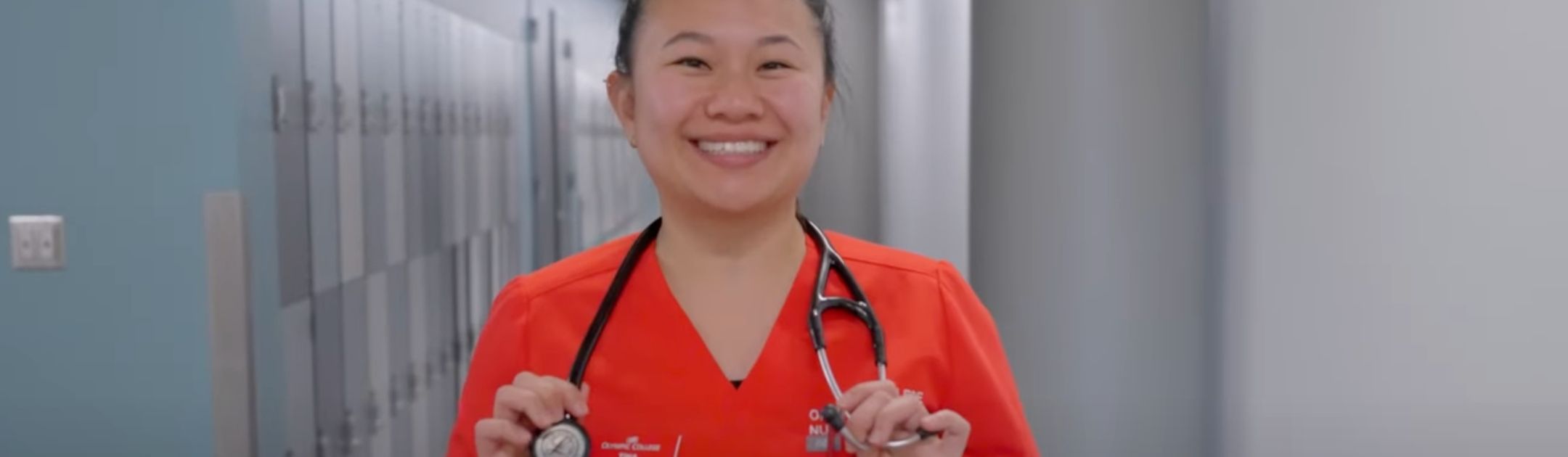 Nursing student posing with stethoscope in Bldg. 7