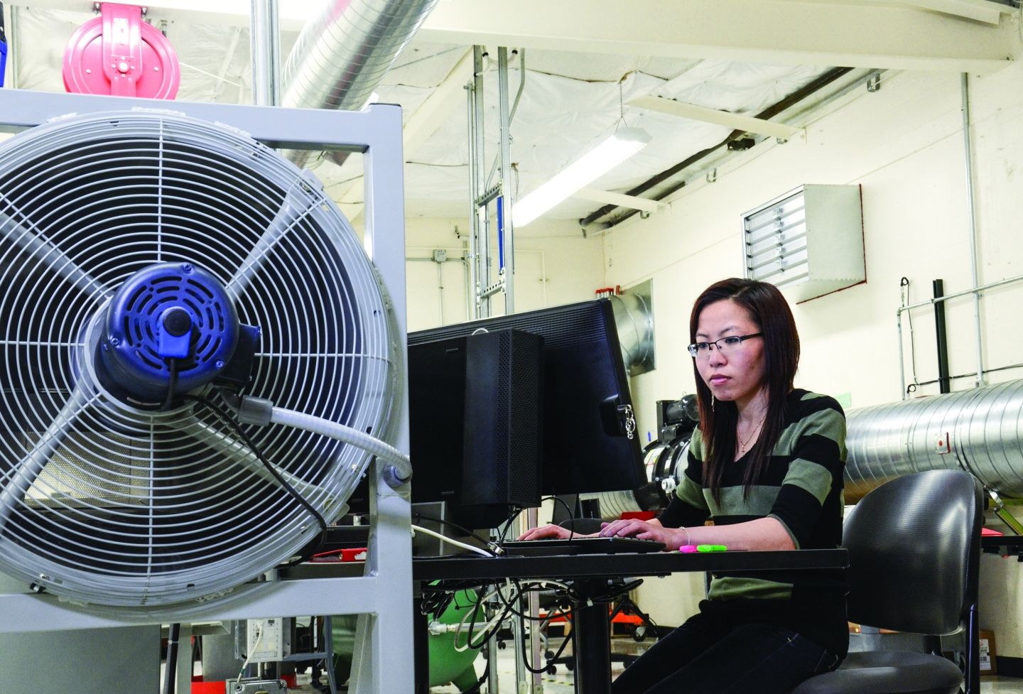 Female Engineer at computer