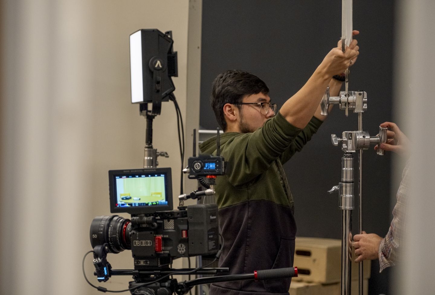 Filmmaking student on set